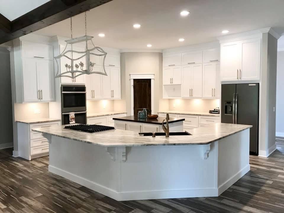 Custom bathroom cabinets with dual sinks by AMJ Homes